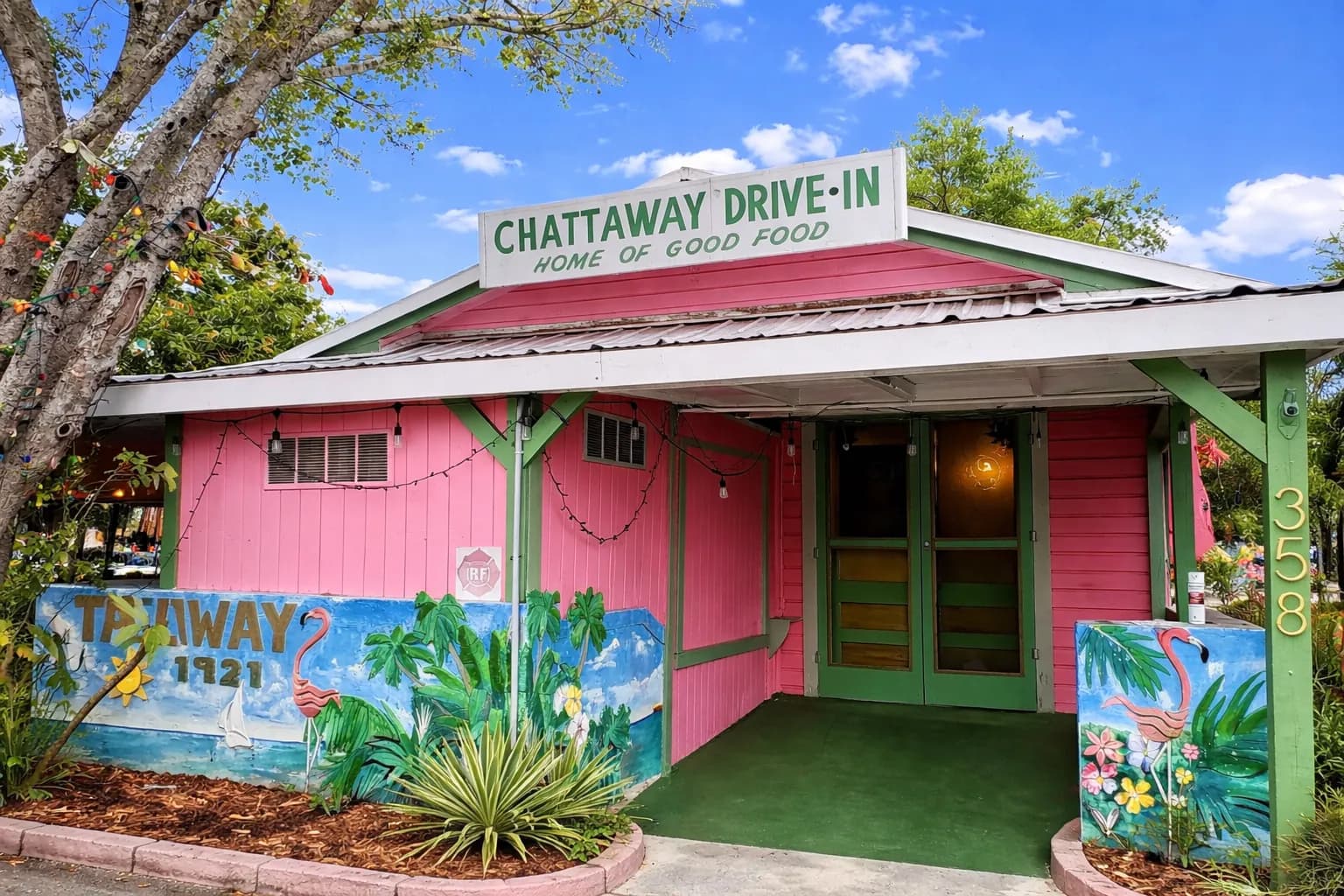 The Chattaway’s pink-and-green front entrance beneath its Drive-In sign.